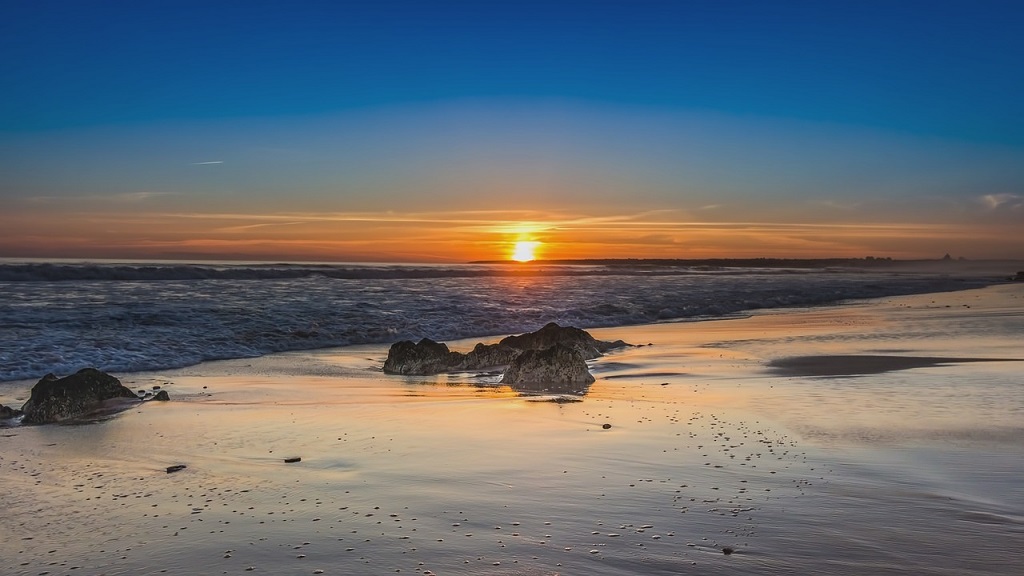 Amazing sunset on a coast on a beautiful beach