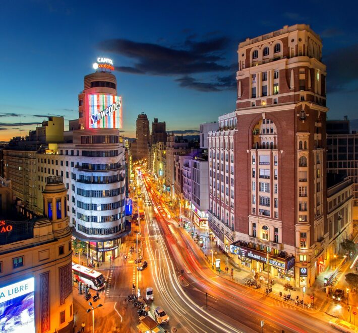 The city lights of Gran Vía street located in central Madrid during night
