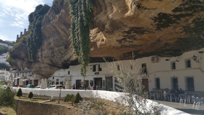 Main white houses that are located in the center of the city of Setenil and under the famous stone