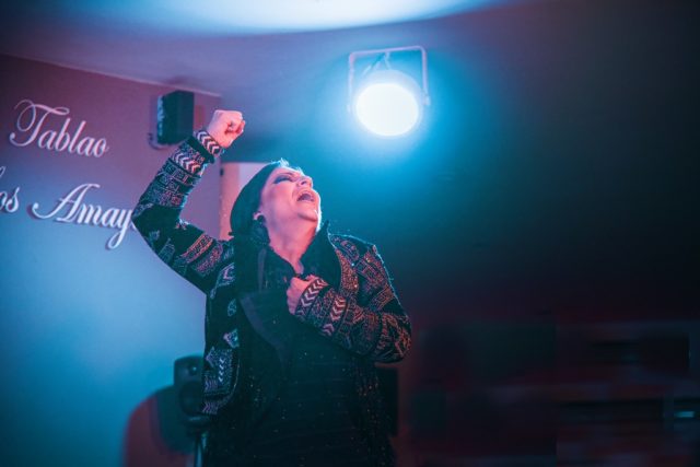 Woman starting the flamenco show