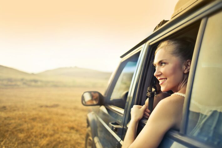 woman in a car during her 2 weeks northern spain road trip itinerary holidays