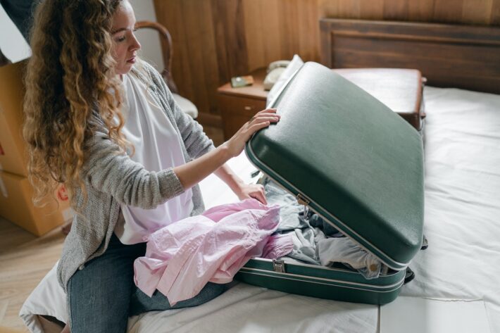 woman packing for spain